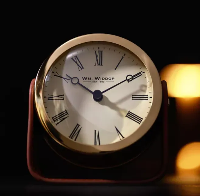 WM.WIDDOP GOLD MANTEL CLOCK ON STAND